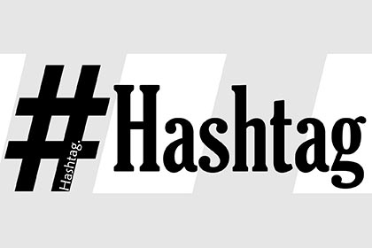 Das Wort #Hashtag, im Hintergrund die leichten Umrisse eines großen Doppelkreuzes.