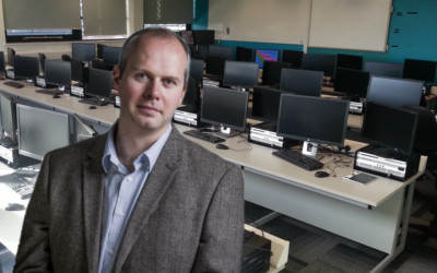 Jacob Habgood, who has an active connection to Sony, in front of our PS4 development kits.